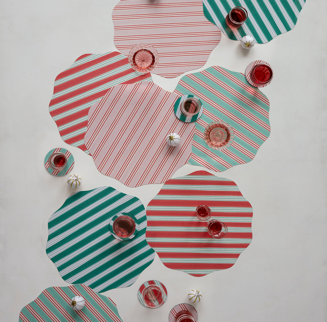 Chilewich striped woven mat with textured terrastrand yarn surface, featuring modern linear design and durable finish.