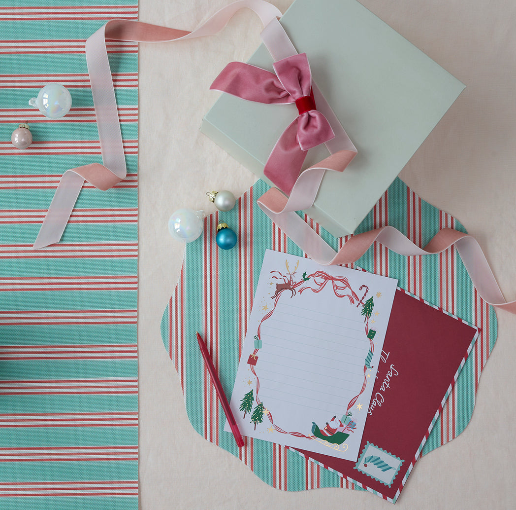 Chilewich striped woven mat with textured terrastrand yarn surface, featuring modern linear design and durable finish.