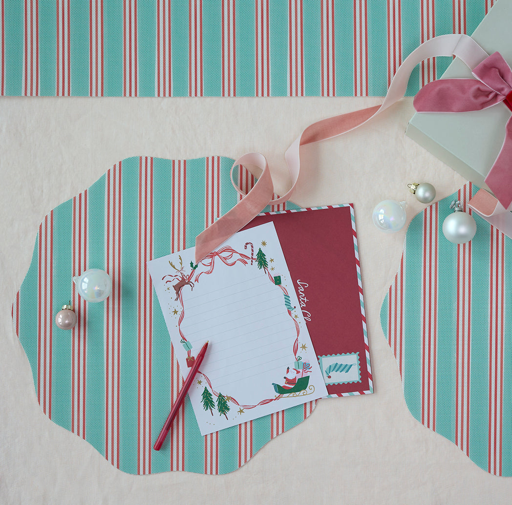 Chilewich striped woven mat with textured terrastrand yarn surface, featuring modern linear design and durable finish.