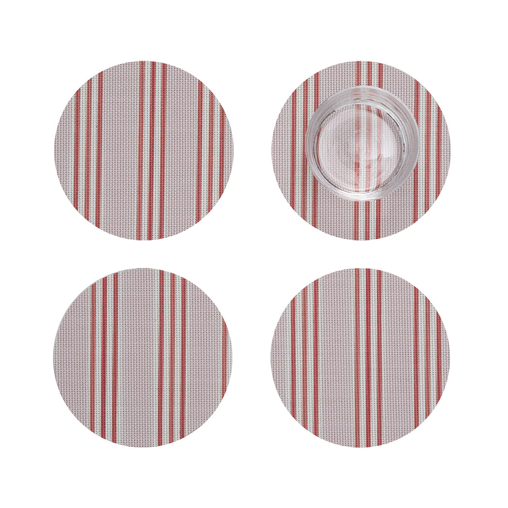 Chilewich striped woven mat with textured terrastrand yarn surface, featuring modern linear design and durable finish.