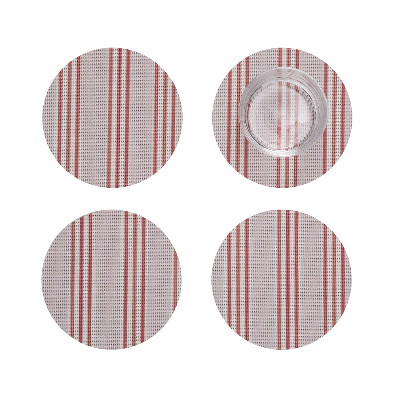 Chilewich striped woven mat with textured terrastrand yarn surface, featuring modern linear design and durable finish.