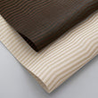 Detail image of Chilewich woven material showcasing texture, color, and pattern of the terrastrand yarn weave.