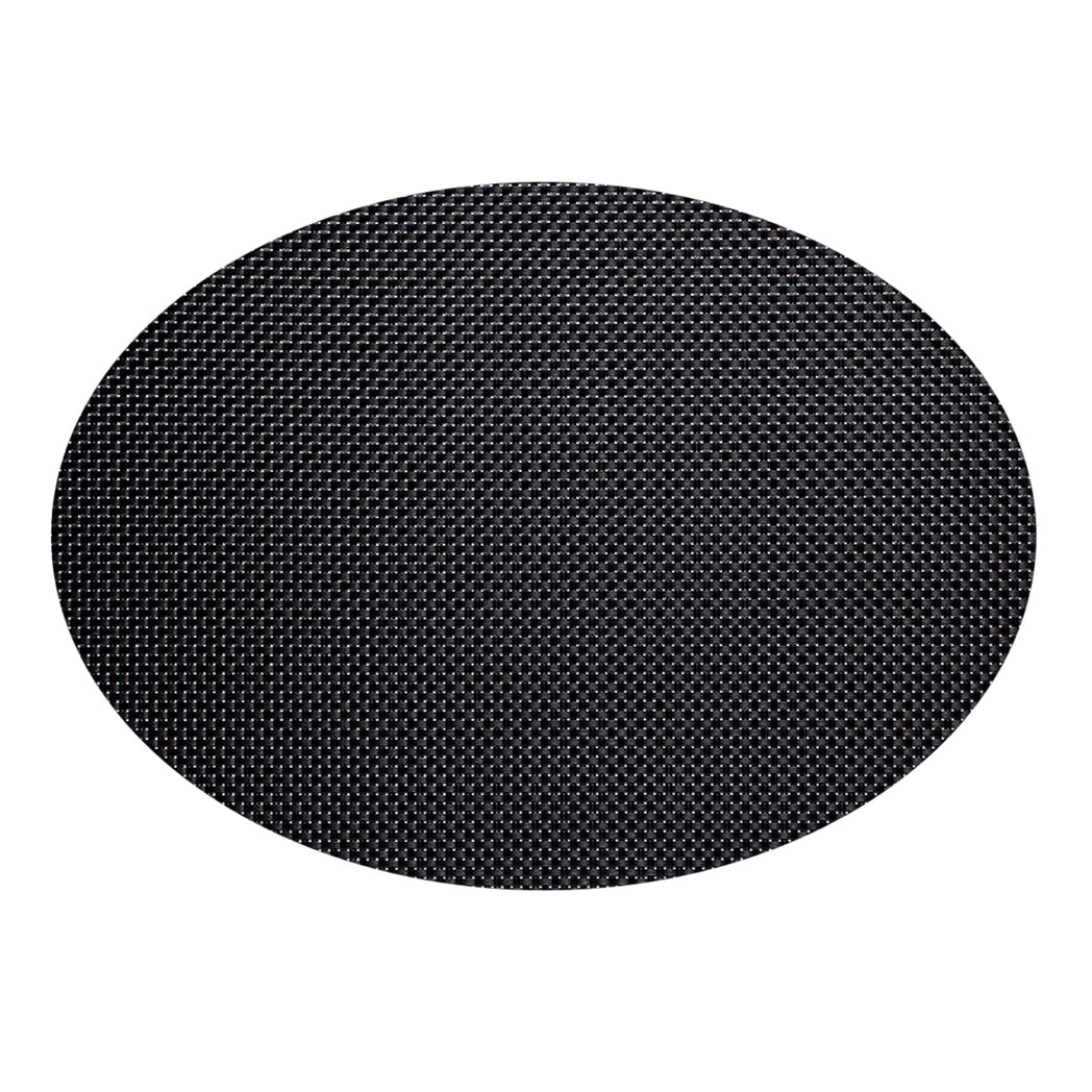 Chilewich Basketweave floor mat in Black, showcasing woven terrastrand yarn texture and modern design aesthetic.