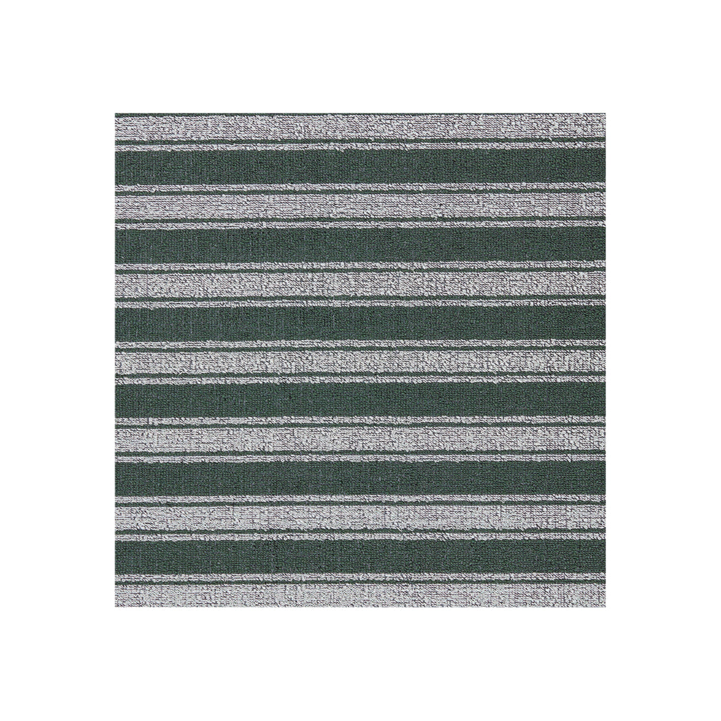 Chilewich striped woven mat with textured terrastrand yarn surface, featuring modern linear design and durable finish.