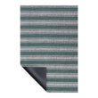 Chilewich striped woven mat with textured terrastrand yarn surface, featuring modern linear design and durable finish.