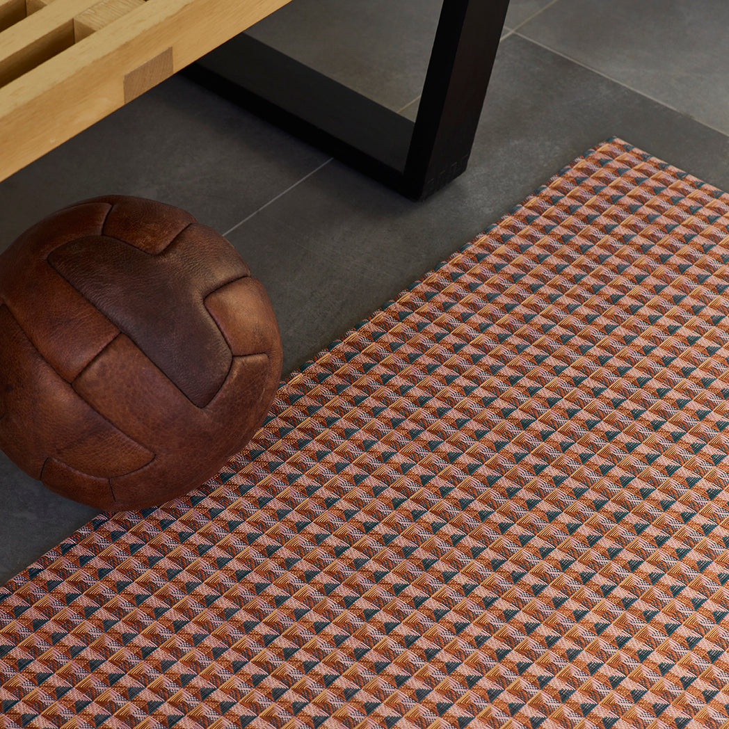 Chilewich woven floor mat in neutral woven terrastrand yarn, durable and stylish for modern living spaces.