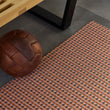 Chilewich woven floor mat in neutral woven terrastrand yarn, durable and stylish for modern living spaces.