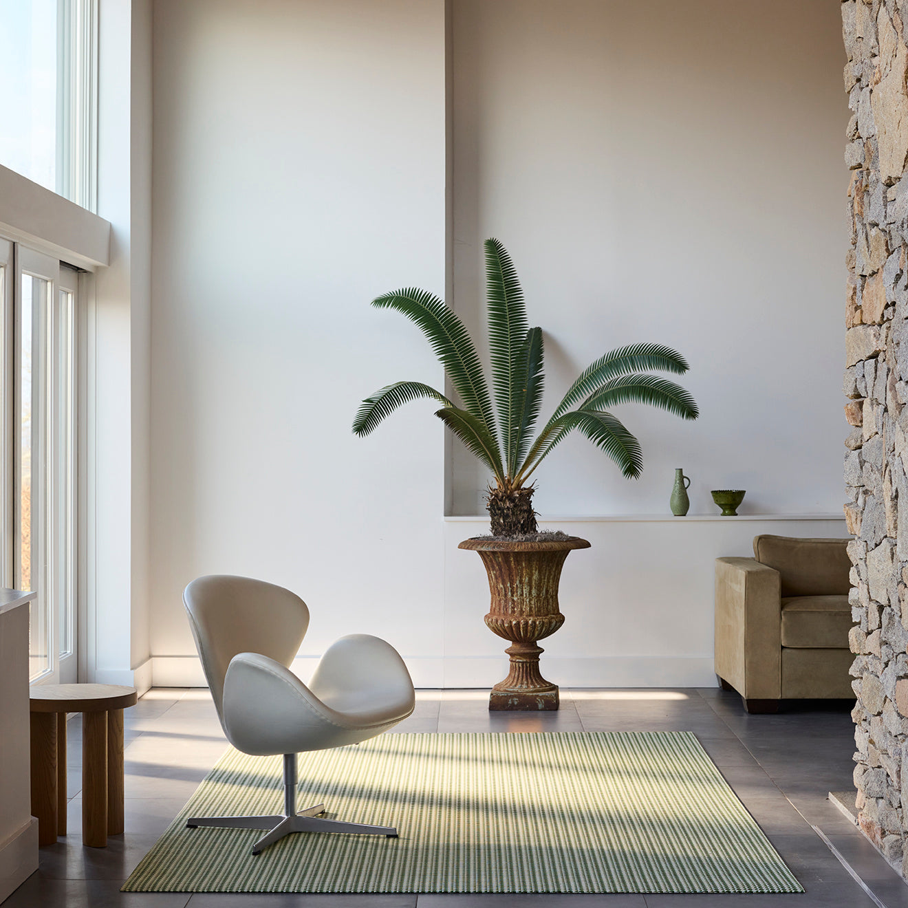 Chilewich woven floor mat in neutral woven terrastrand yarn, durable and stylish for modern living spaces.