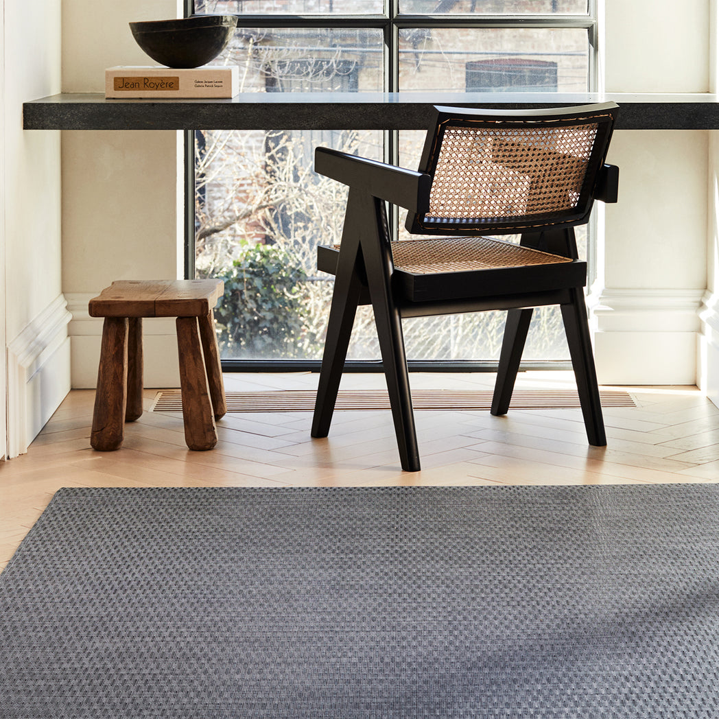 Chilewich woven floor mat in neutral woven terrastrand yarn, durable and stylish for modern living spaces.