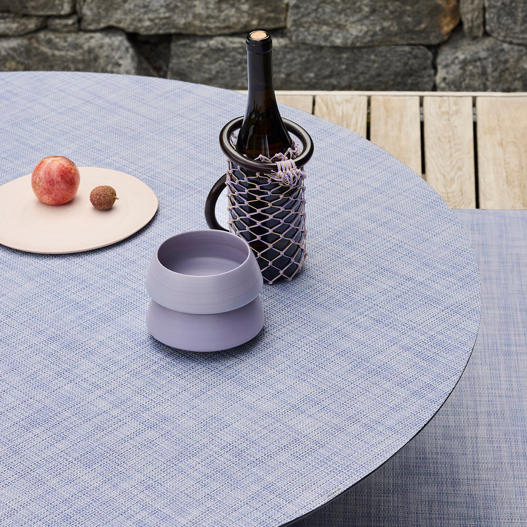 Chilewich Basketweave floor mat in Periwinkle, showcasing woven terrastrand yarn texture and modern design aesthetic.
