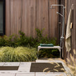 Chilewich striped woven mat with textured terrastrand yarn surface, featuring modern linear design and durable finish.
