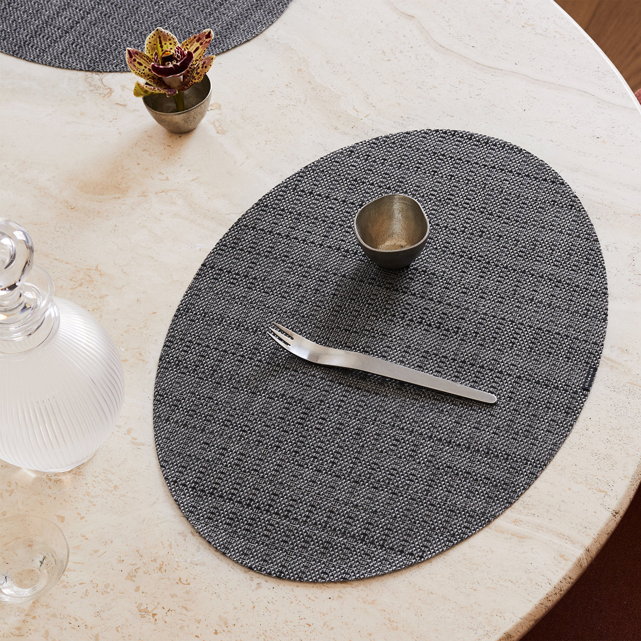 Detail image of Chilewich woven material showcasing texture, color, and pattern of the terrastrand yarn weave.