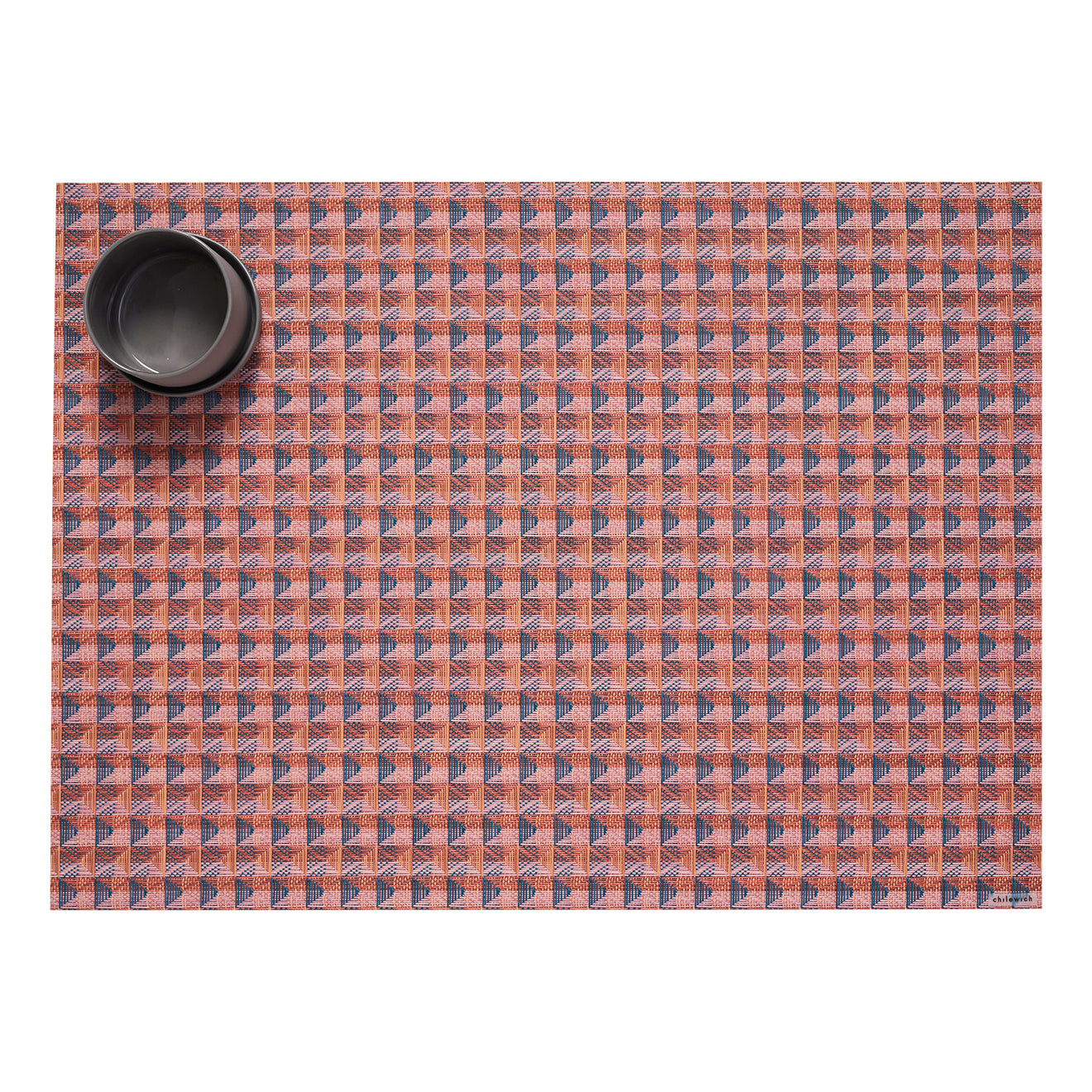 Chilewich woven placemat with subtle texture and contemporary design, ideal for dining and tabletop decor.