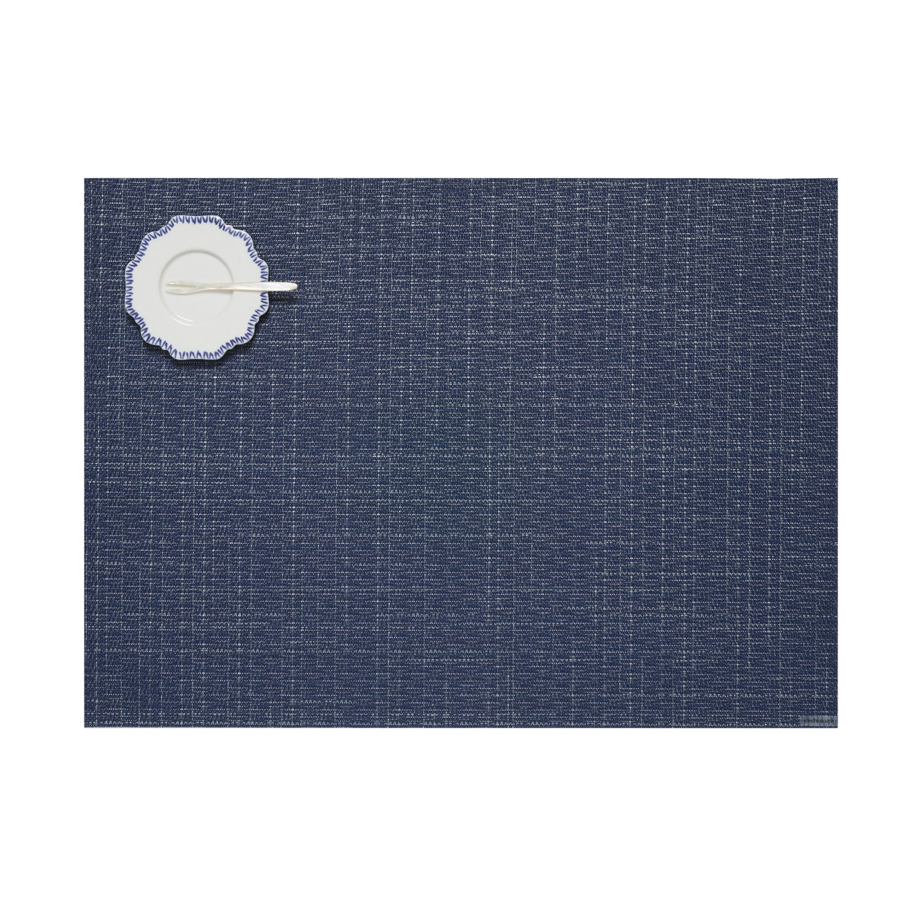 Chilewich woven placemat with subtle texture and contemporary design, ideal for dining and tabletop decor.