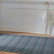 Chilewich woven floor mat in neutral woven terrastrand yarn, durable and stylish for modern living spaces.