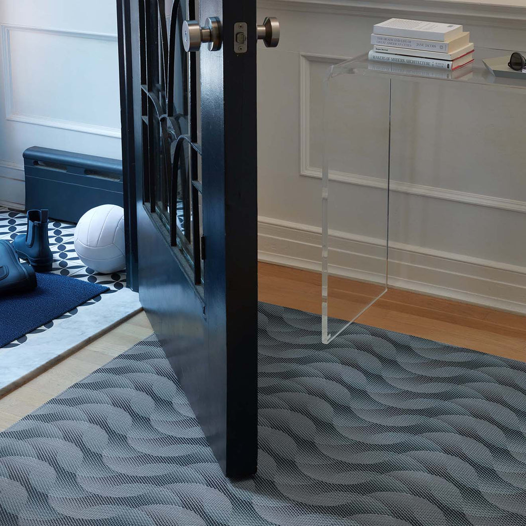 Chilewich woven floor mat in neutral woven terrastrand yarn, durable and stylish for modern living spaces.