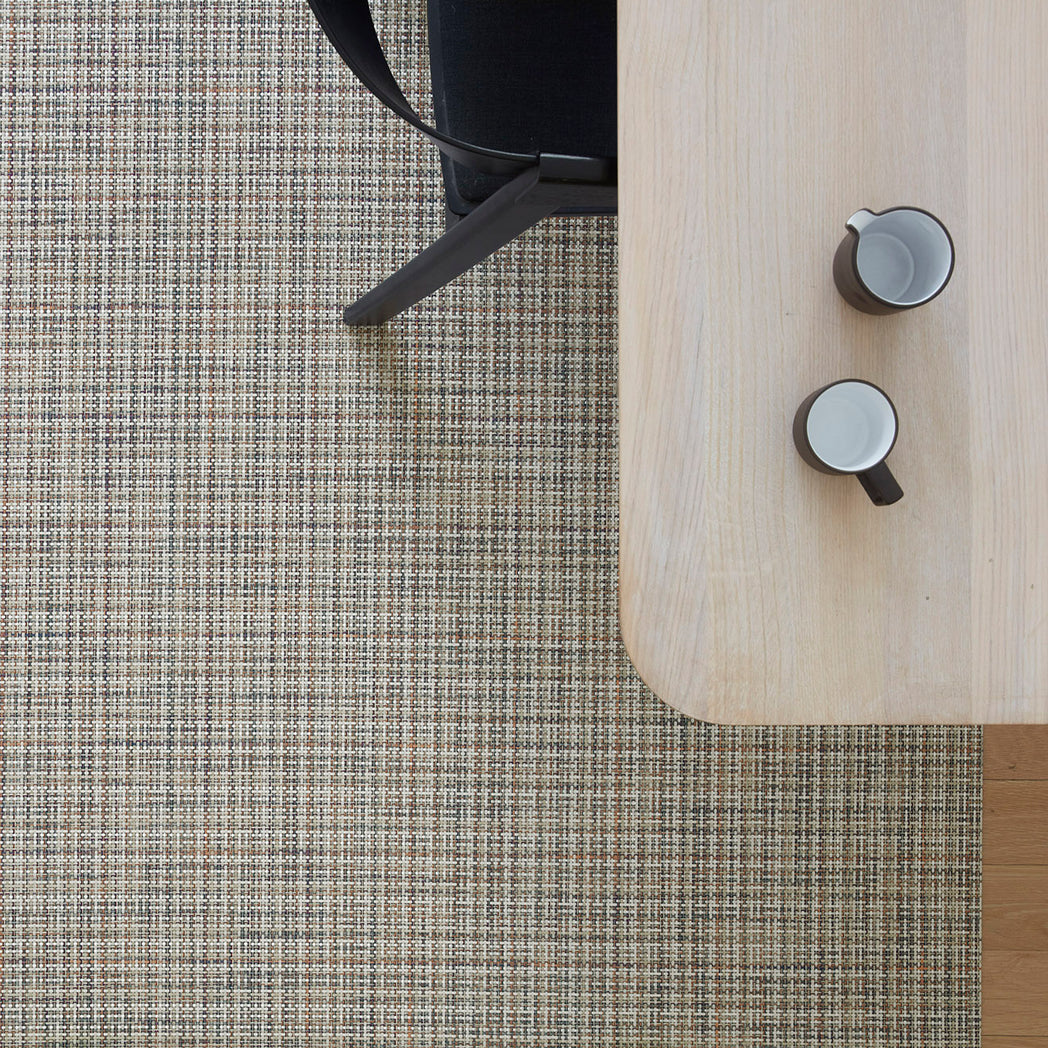 Chilewich Basketweave floor mat in BonBon, showcasing woven terrastrand yarn texture and modern design aesthetic.