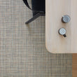 Chilewich Basketweave floor mat in BonBon, showcasing woven terrastrand yarn texture and modern design aesthetic.