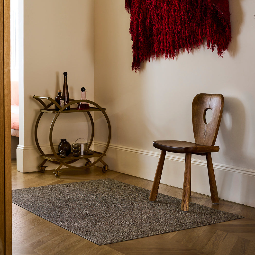 Chilewich woven floor mat in neutral woven terrastrand yarn, durable and stylish for modern living spaces.