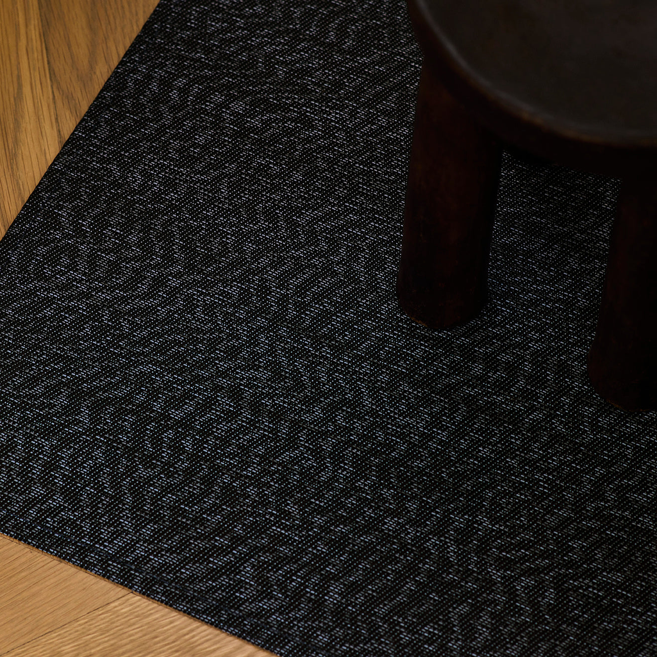 Chilewich woven floor mat in neutral woven terrastrand yarn, durable and stylish for modern living spaces.