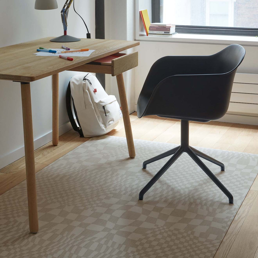 Chilewich woven floor mat in neutral woven terrastrand yarn, durable and stylish for modern living spaces.
