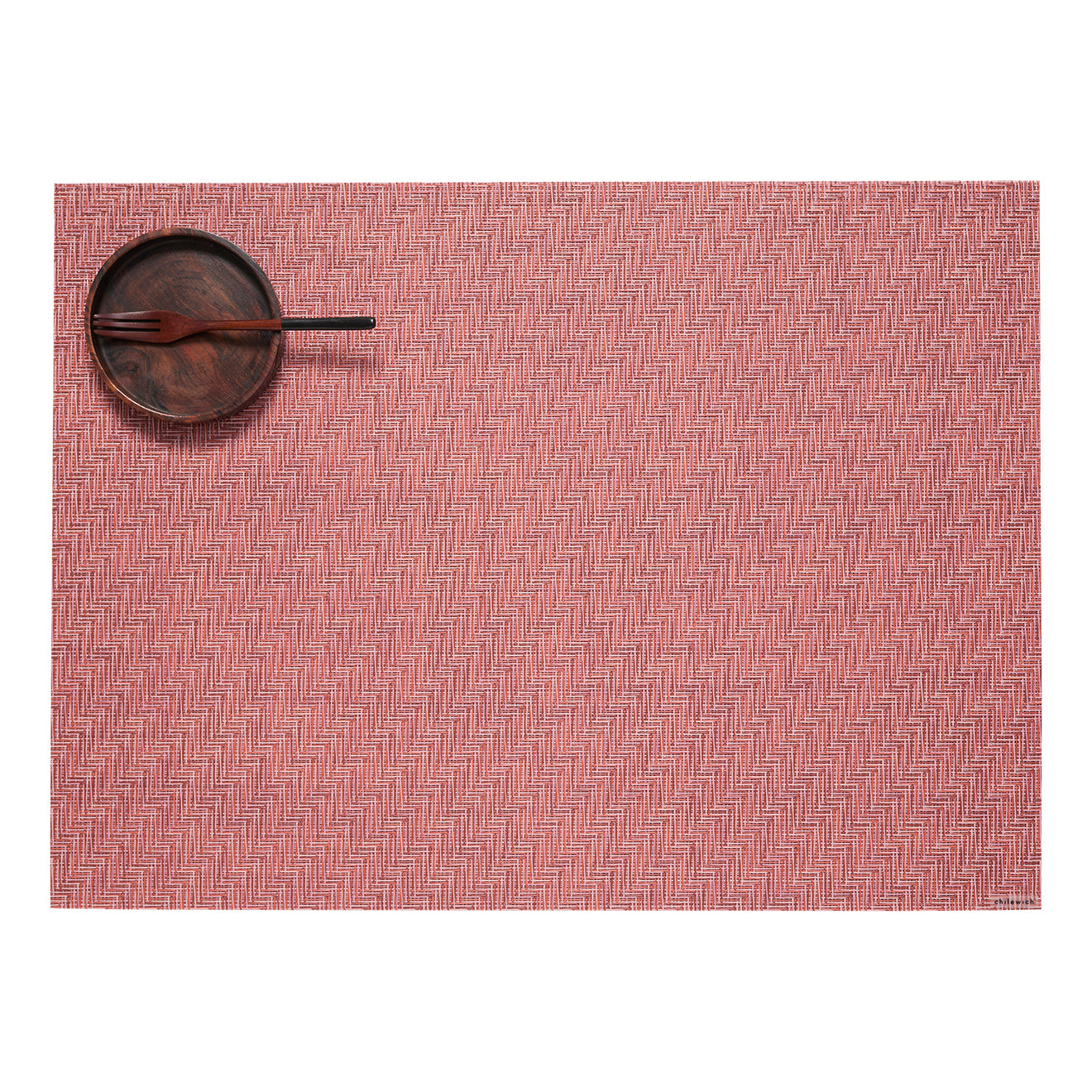 Chilewich woven placemat with subtle texture and contemporary design, ideal for dining and tabletop decor.