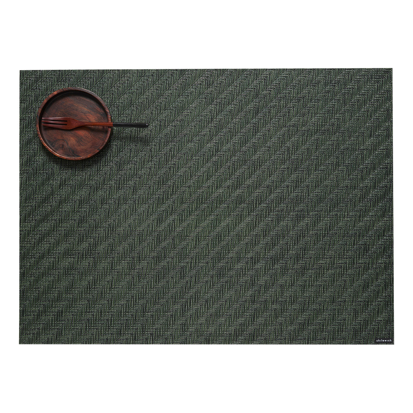 Chilewich woven placemat with subtle texture and contemporary design, ideal for dining and tabletop decor.
