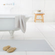 Chilewich woven floor mat in neutral woven terrastrand yarn, durable and stylish for modern living spaces.