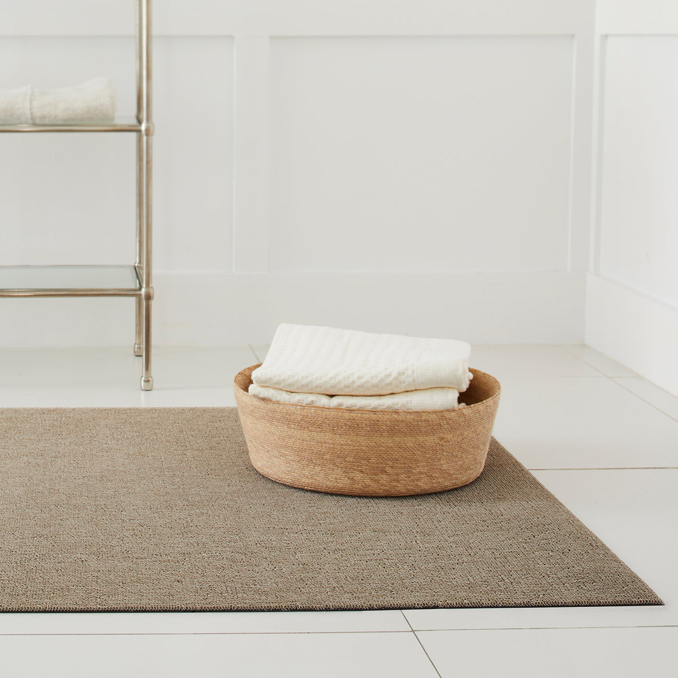 Chilewich woven floor mat in neutral woven terrastrand yarn, durable and stylish for modern living spaces.