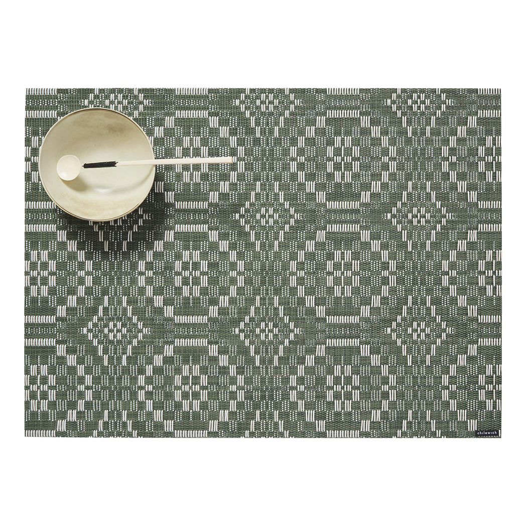 Chilewich woven placemat with subtle texture and contemporary design, ideal for dining and tabletop decor.