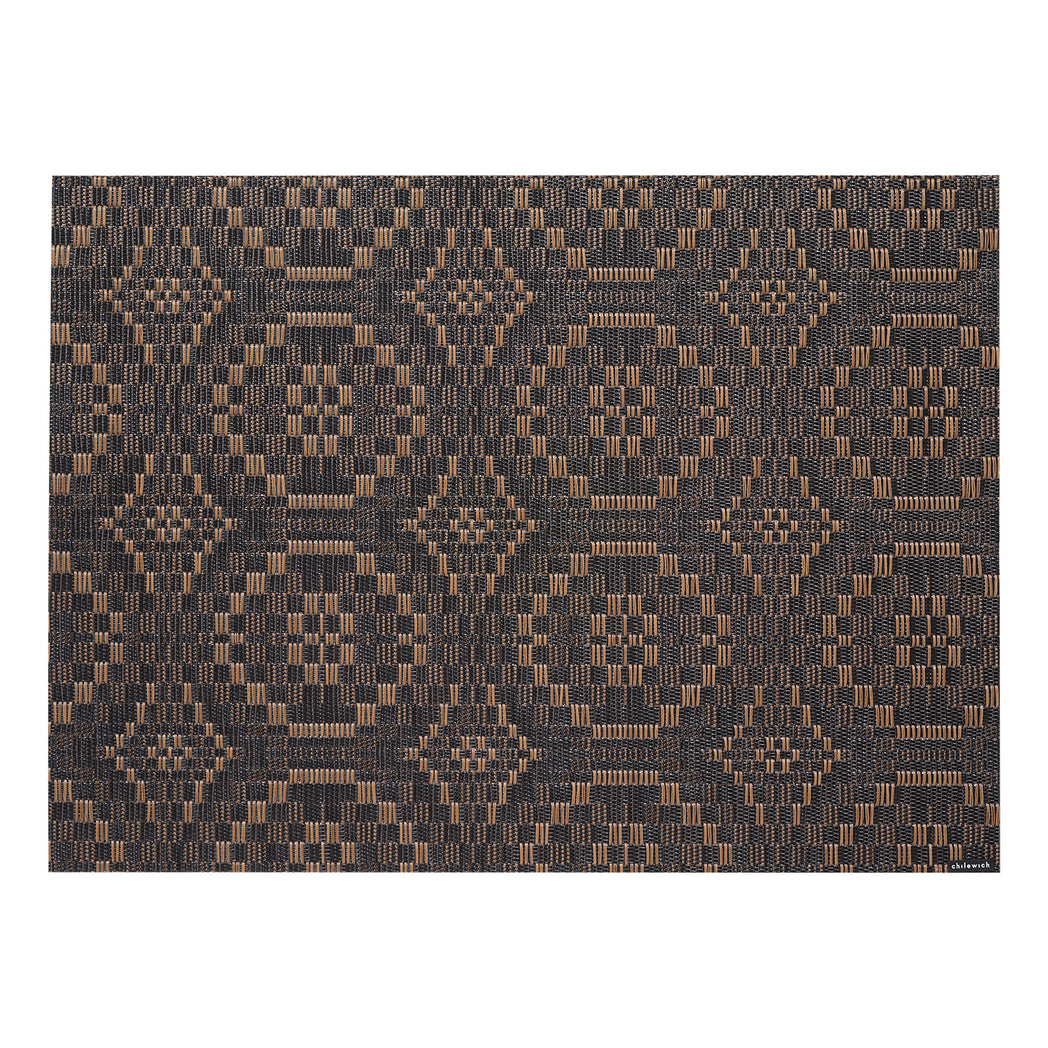 Chilewich woven placemat with subtle texture and contemporary design, ideal for dining and tabletop decor.