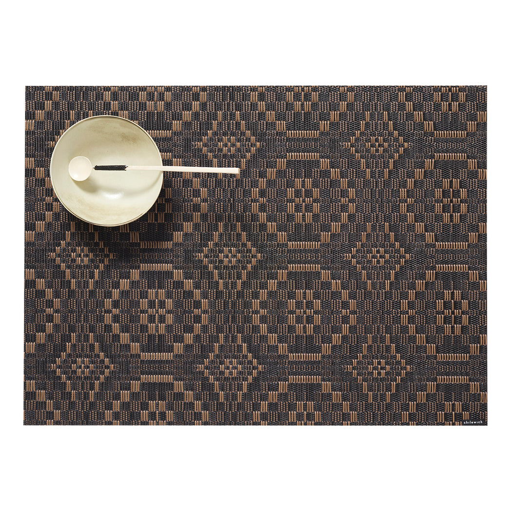 Chilewich woven placemat with subtle texture and contemporary design, ideal for dining and tabletop decor.