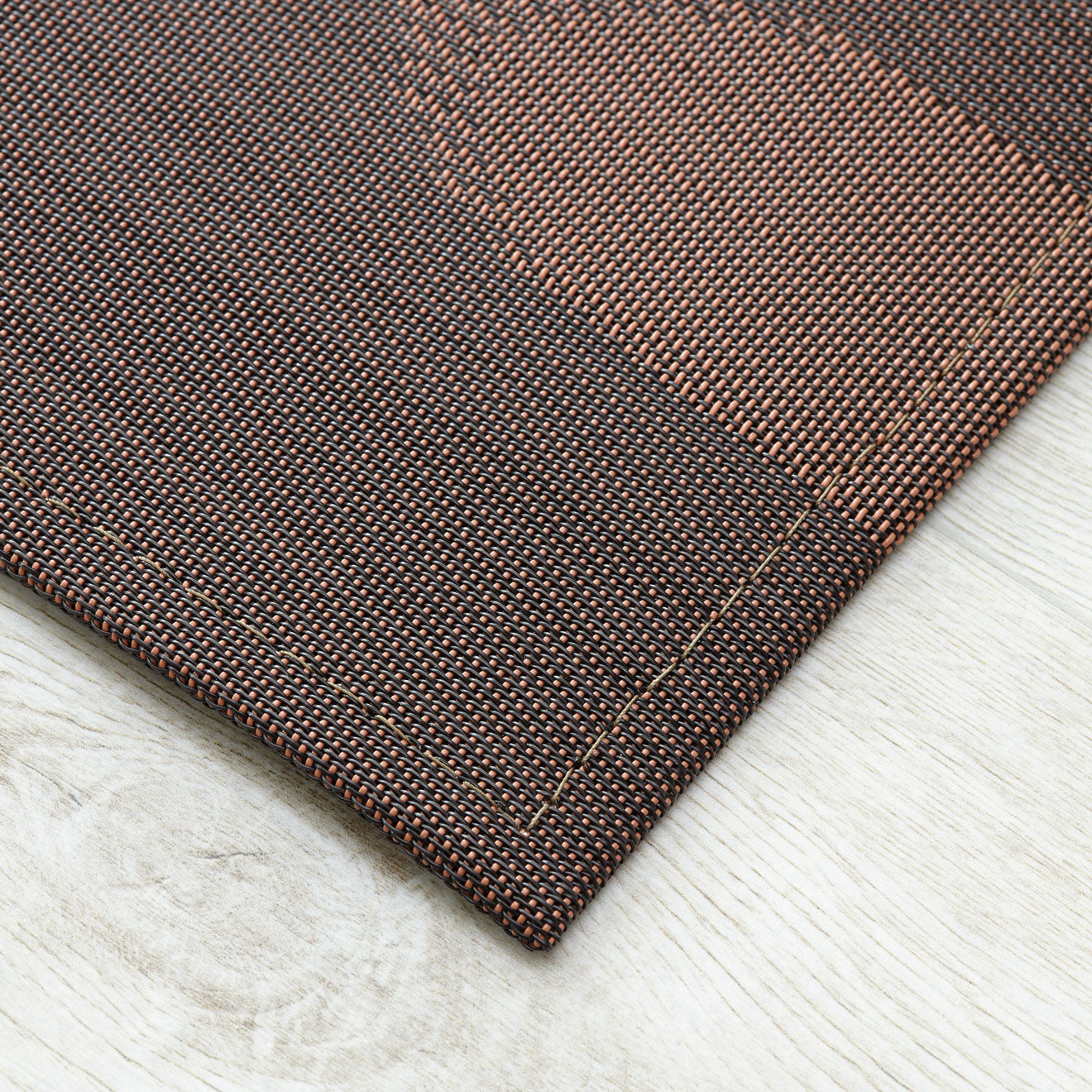 Detail image of Chilewich woven material showcasing texture, color, and pattern of the terrastrand yarn weave.