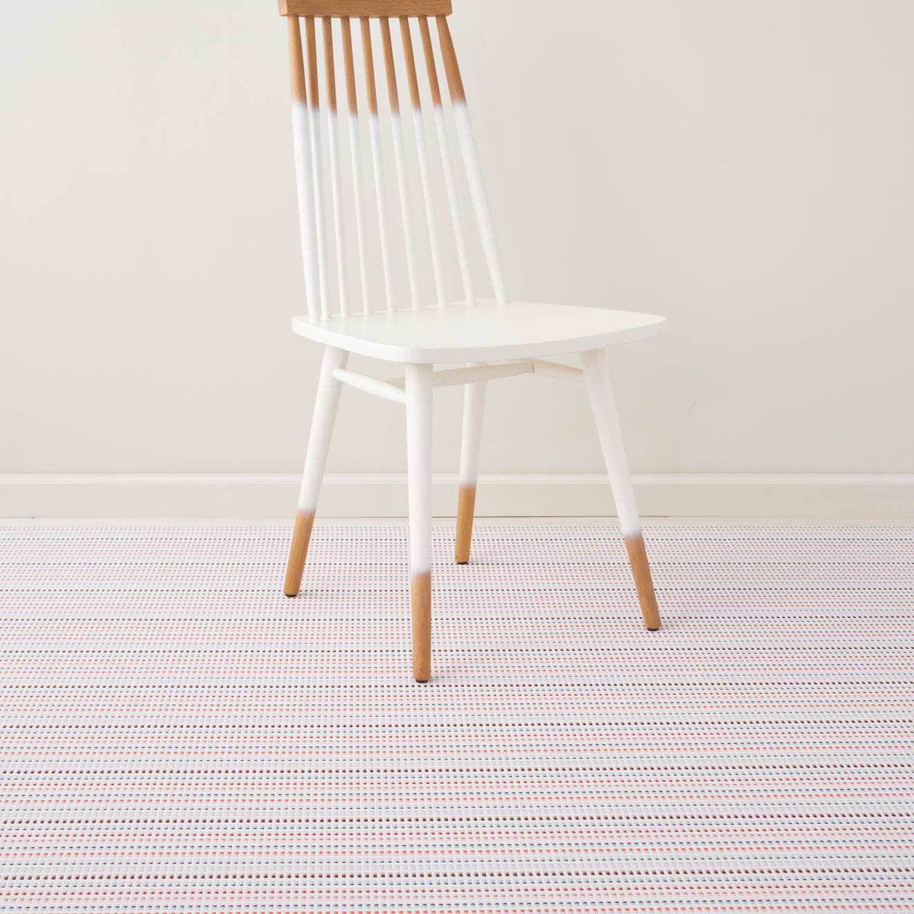 Pop Woven Floor Mat with Prop in Light Neutral Beige with Light Pink, Lavender, Dark Blue and Bright Orange Pink