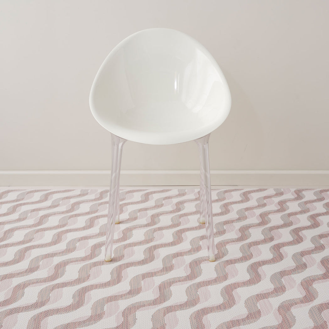 Magnolia Woven Floor Mat with Prop in Light Neutral Beige Base with Muted Pink and Midtone Brown