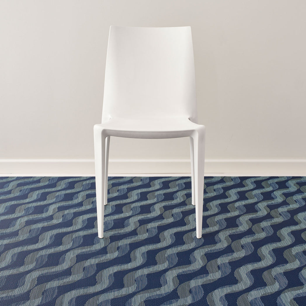 Ocean Woven Floor Mat with Prop in Dark Navy Base with Muted Blue Green Tones
