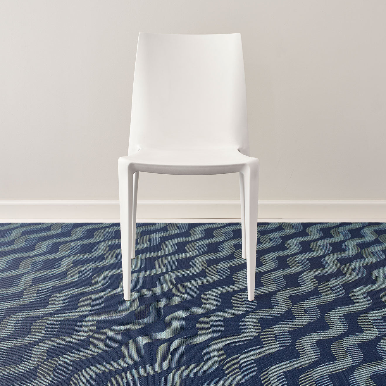 Ocean Woven Floor Mat with Prop in Dark Navy Base with Muted Blue Green Tones