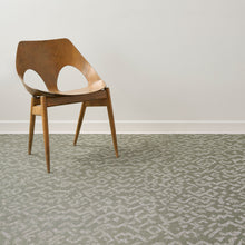 Artichoke Woven Floor Mat with Prop in Mix of Midtone Warm Green and White