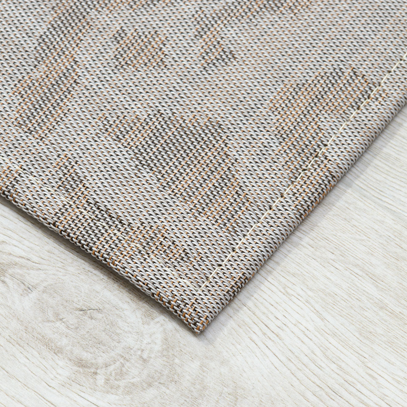 Tumbleweed Woven Floor Mat Detail in Mix of Light Warm Grey, Golden Brown and Dark Brown