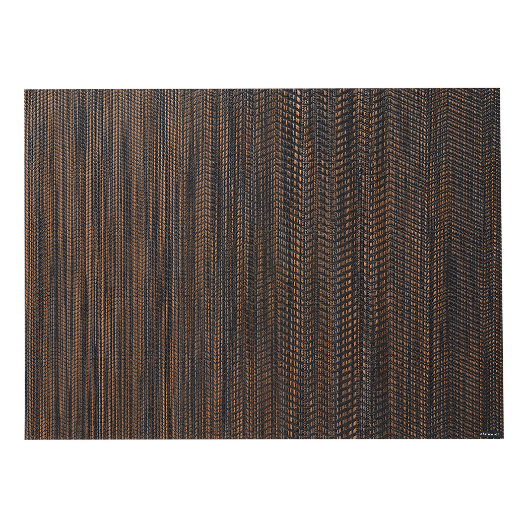 Chilewich woven placemat with subtle texture and contemporary design, ideal for dining and tabletop decor.