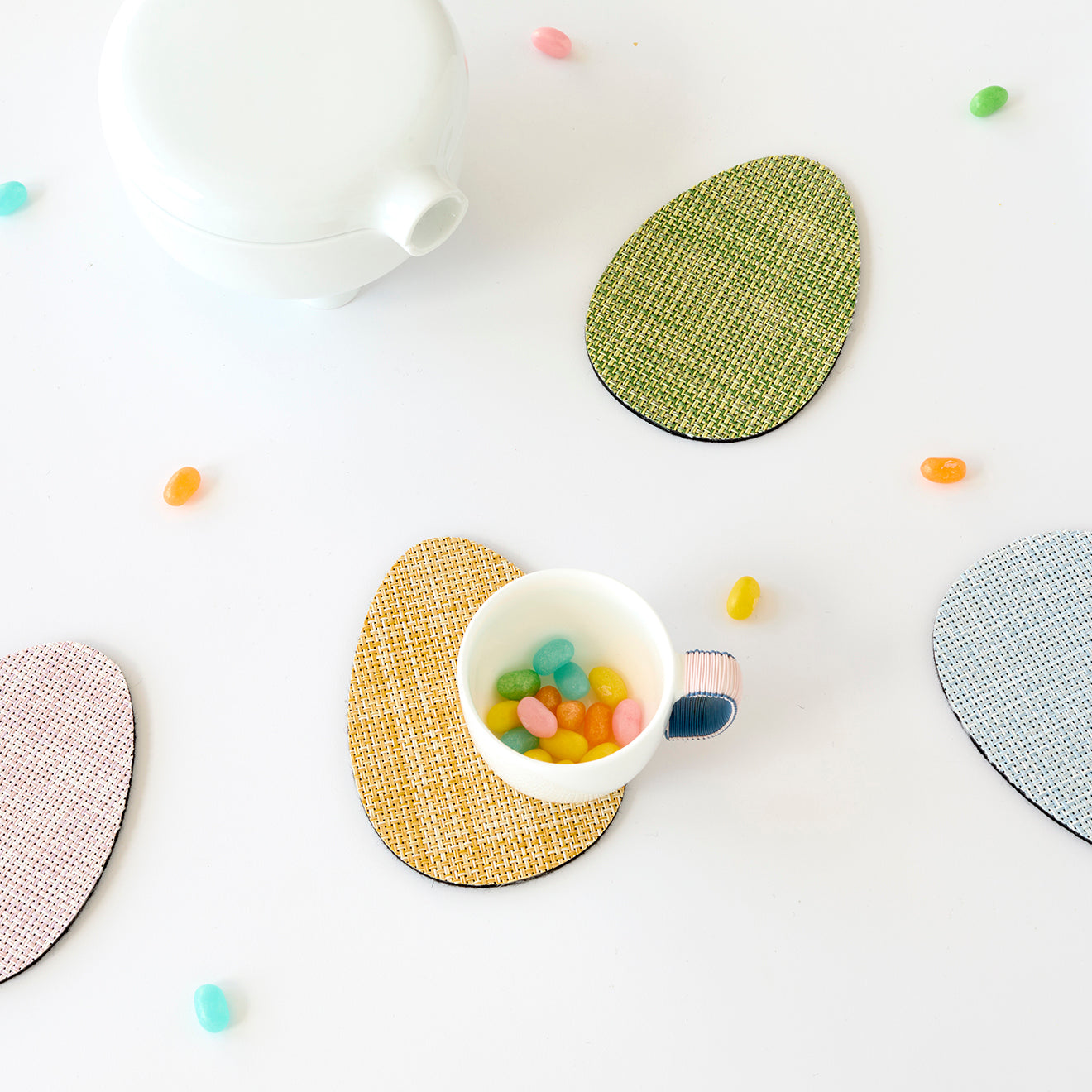 Chilewich Basketweave floor mat in egg, showcasing woven terrastrand yarn texture and modern design aesthetic.