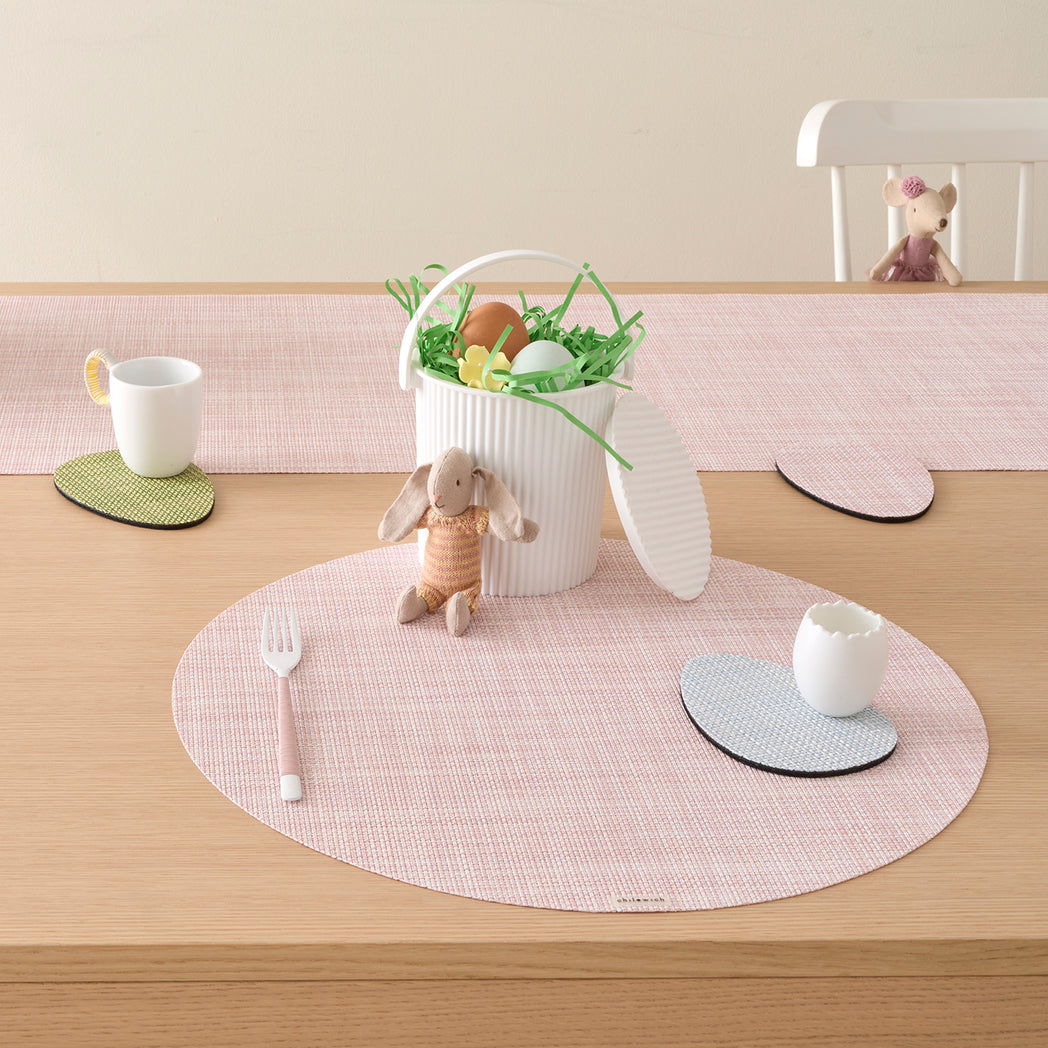 Chilewich Basketweave floor mat in egg, showcasing woven terrastrand yarn texture and modern design aesthetic.