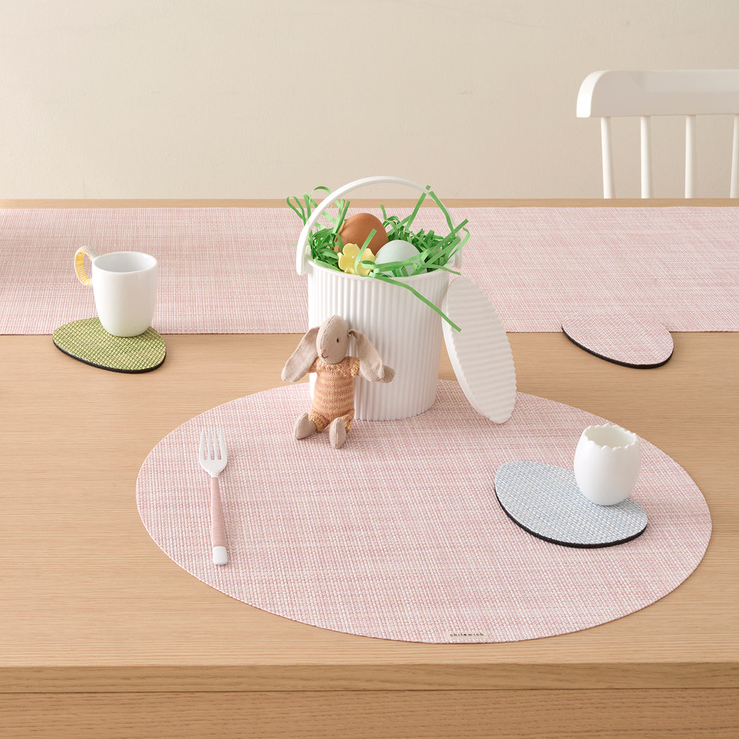 Chilewich Basketweave floor mat in egg, showcasing woven terrastrand yarn texture and modern design aesthetic.