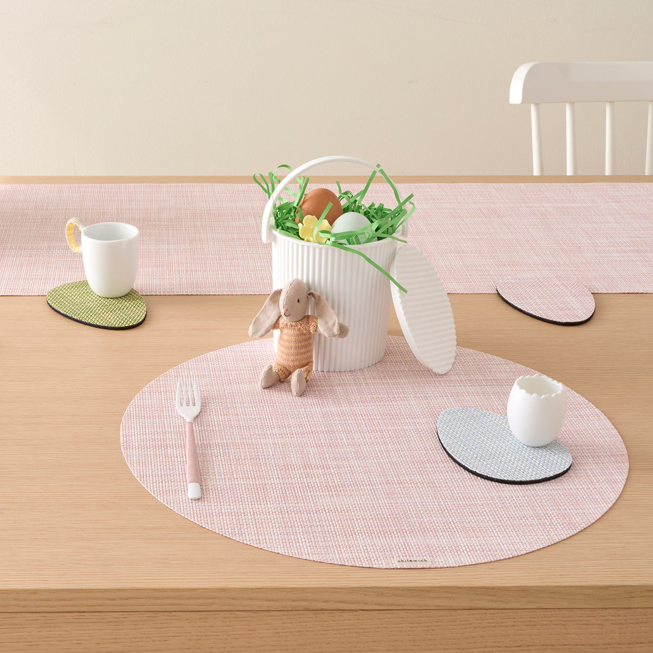 Chilewich Basketweave floor mat in egg, showcasing woven terrastrand yarn texture and modern design aesthetic.