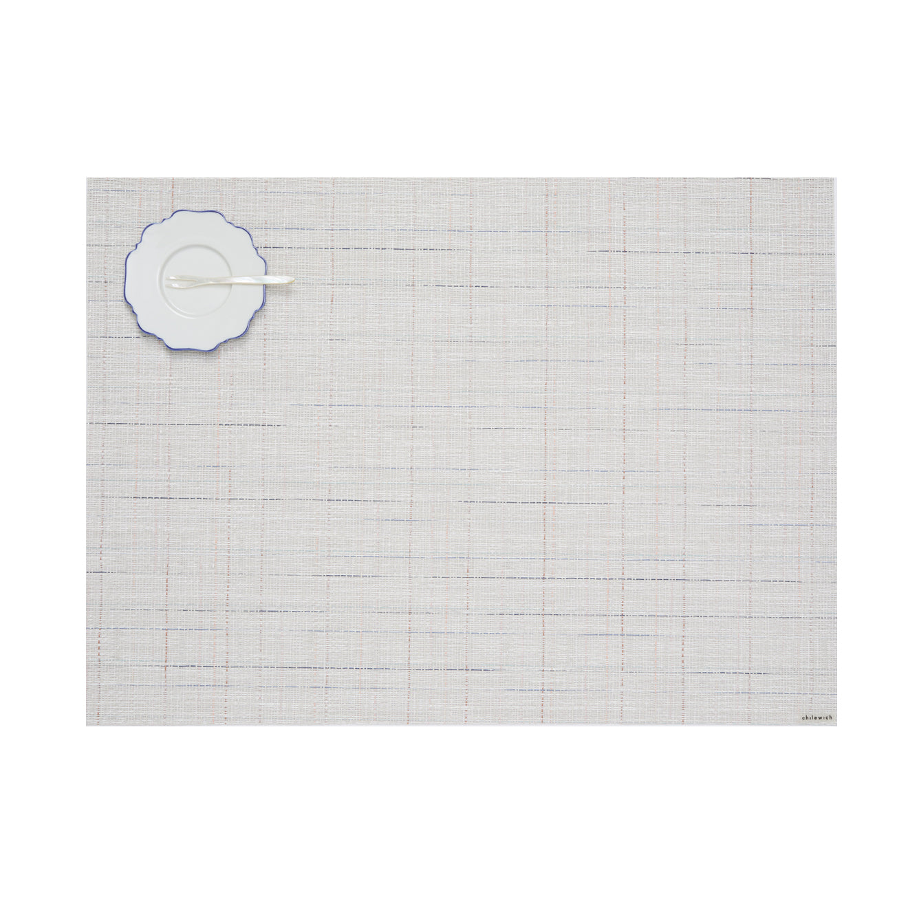 Detail image of Chilewich woven material showcasing texture, color, and pattern of the terrastrand yarn weave.