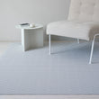 Chilewich woven floor mat in neutral woven terrastrand yarn, durable and stylish for modern living spaces.