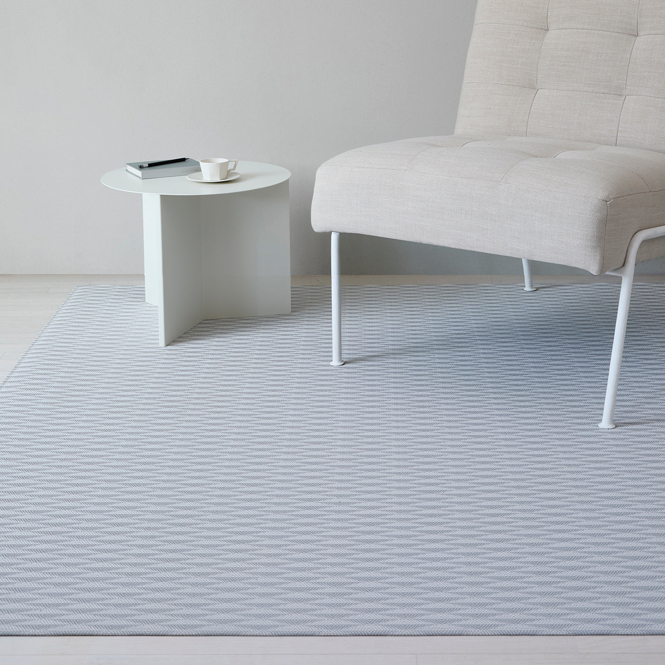 Chilewich woven floor mat in neutral woven terrastrand yarn, durable and stylish for modern living spaces.