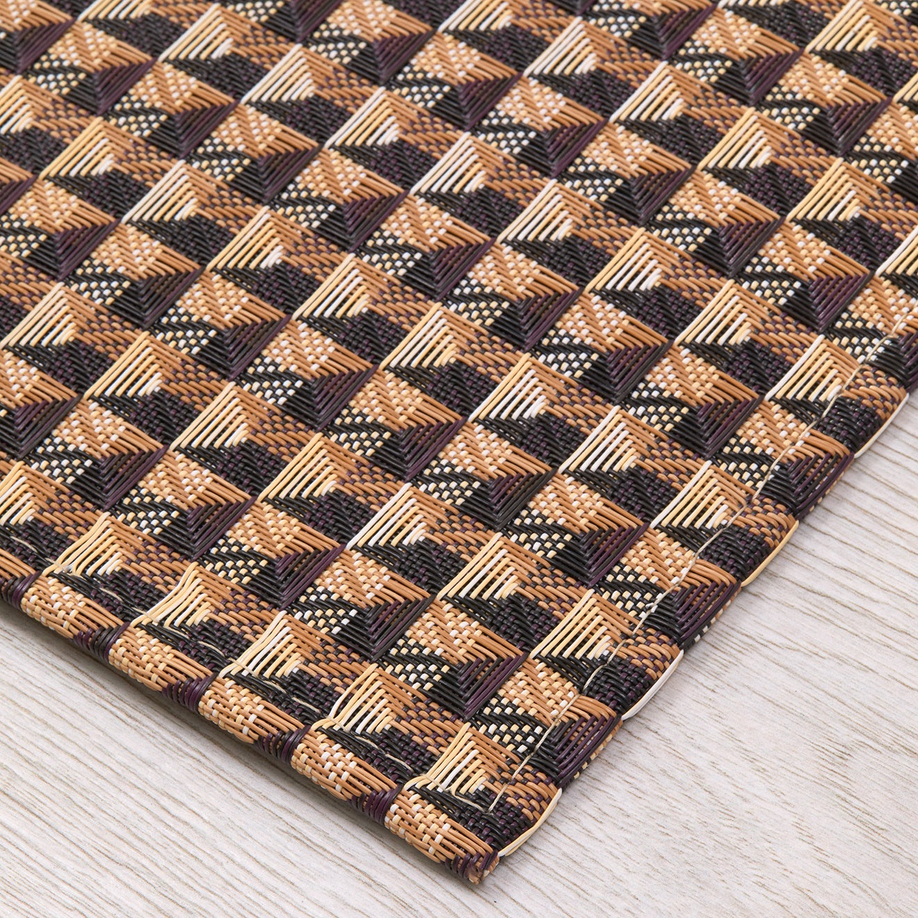 Chilewich woven floor mat in neutral woven terrastrand yarn, durable and stylish for modern living spaces.
