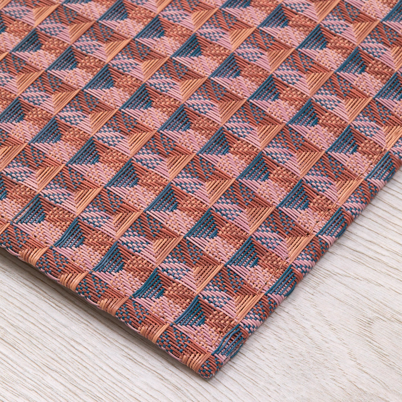 Chilewich woven floor mat in neutral woven terrastrand yarn, durable and stylish for modern living spaces.