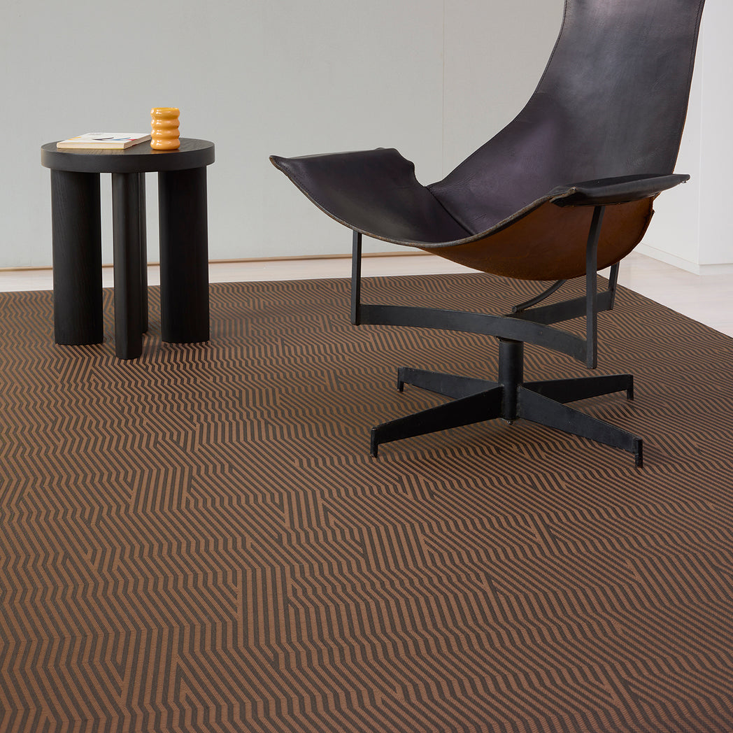 Chilewich woven floor mat in neutral woven terrastrand yarn, durable and stylish for modern living spaces.